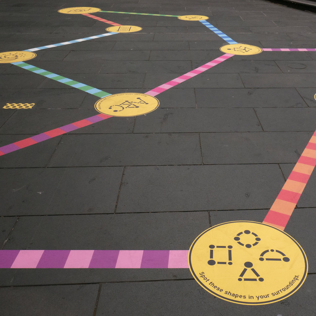 A public art installation of bespoke and site-specific mini-games and colourful branching paths.